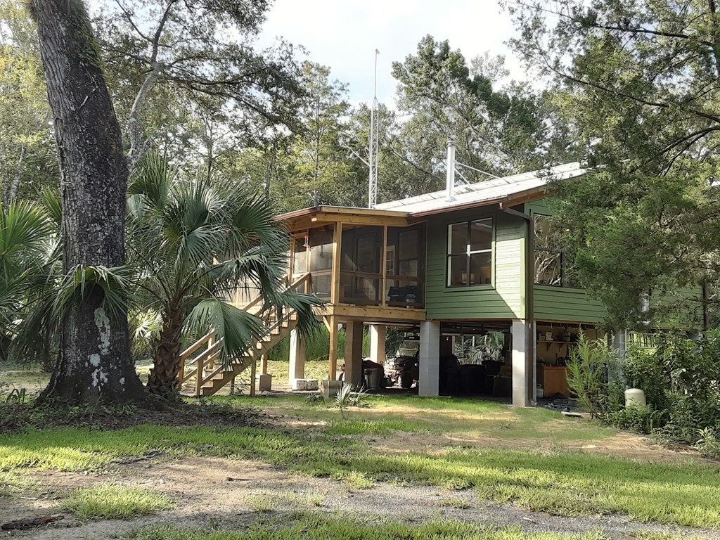 Off Grid Florida Off-grid - Self-sustaining Cabin on 60 Acres - Florida - SurvivalRealty.com