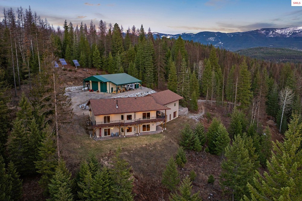 Image showcasing Custom Off-Grid Mountain Estate - SurvivalRealty.com